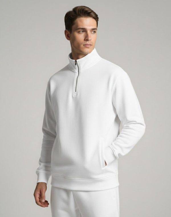 Model wearing a white Frontier Falcon quarter-zip sweatshirt with a clean, minimalist design.